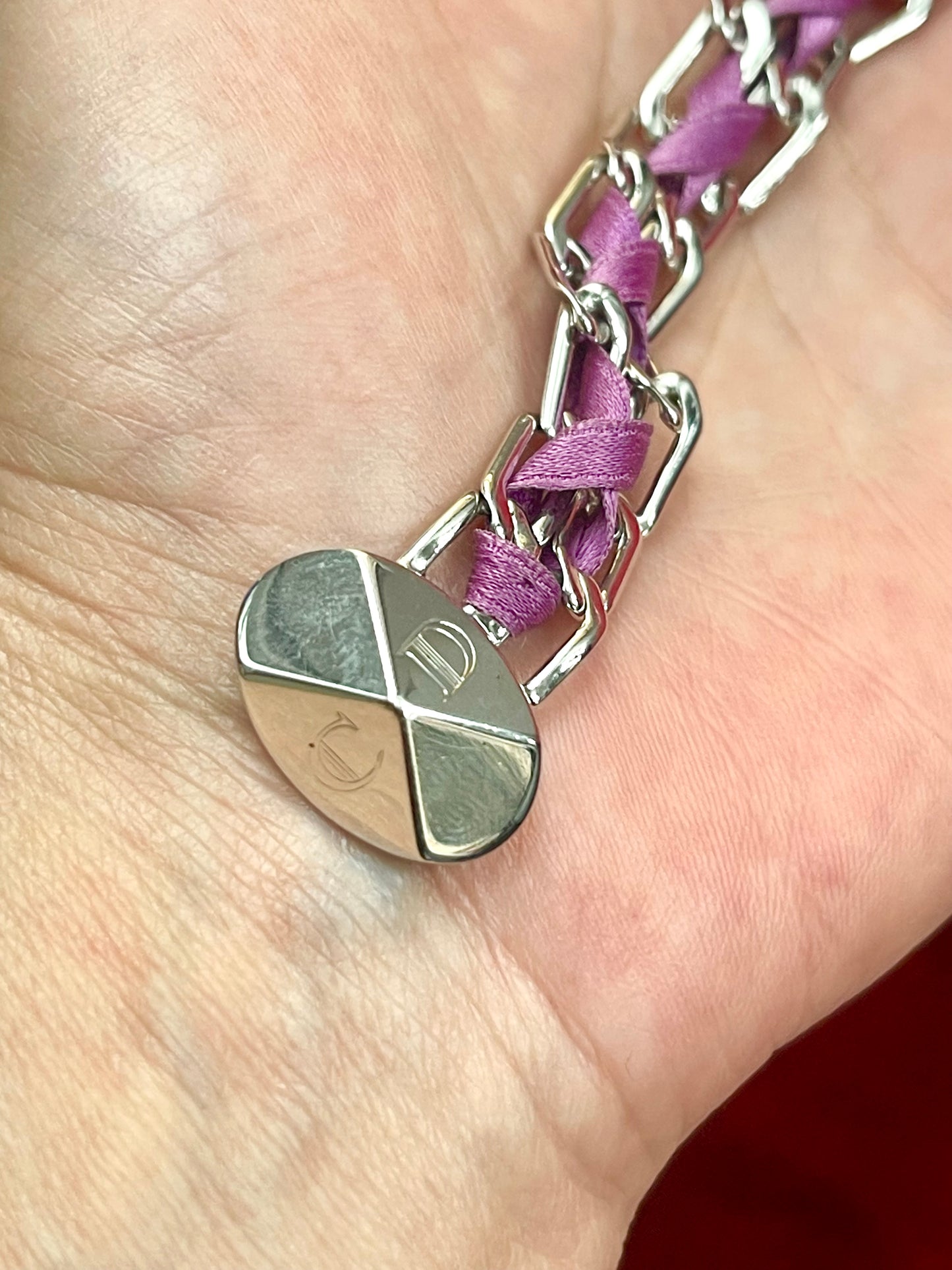 Christian Dior silver tone bracelet signed clasp close up