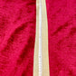 105cm length vintage silver Paco Rabanne mesh belt on red velvet background using a measuring tape 