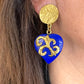 Boucles d'oreilles vintage Yves Saint Laurent Coeurs bleus ton or