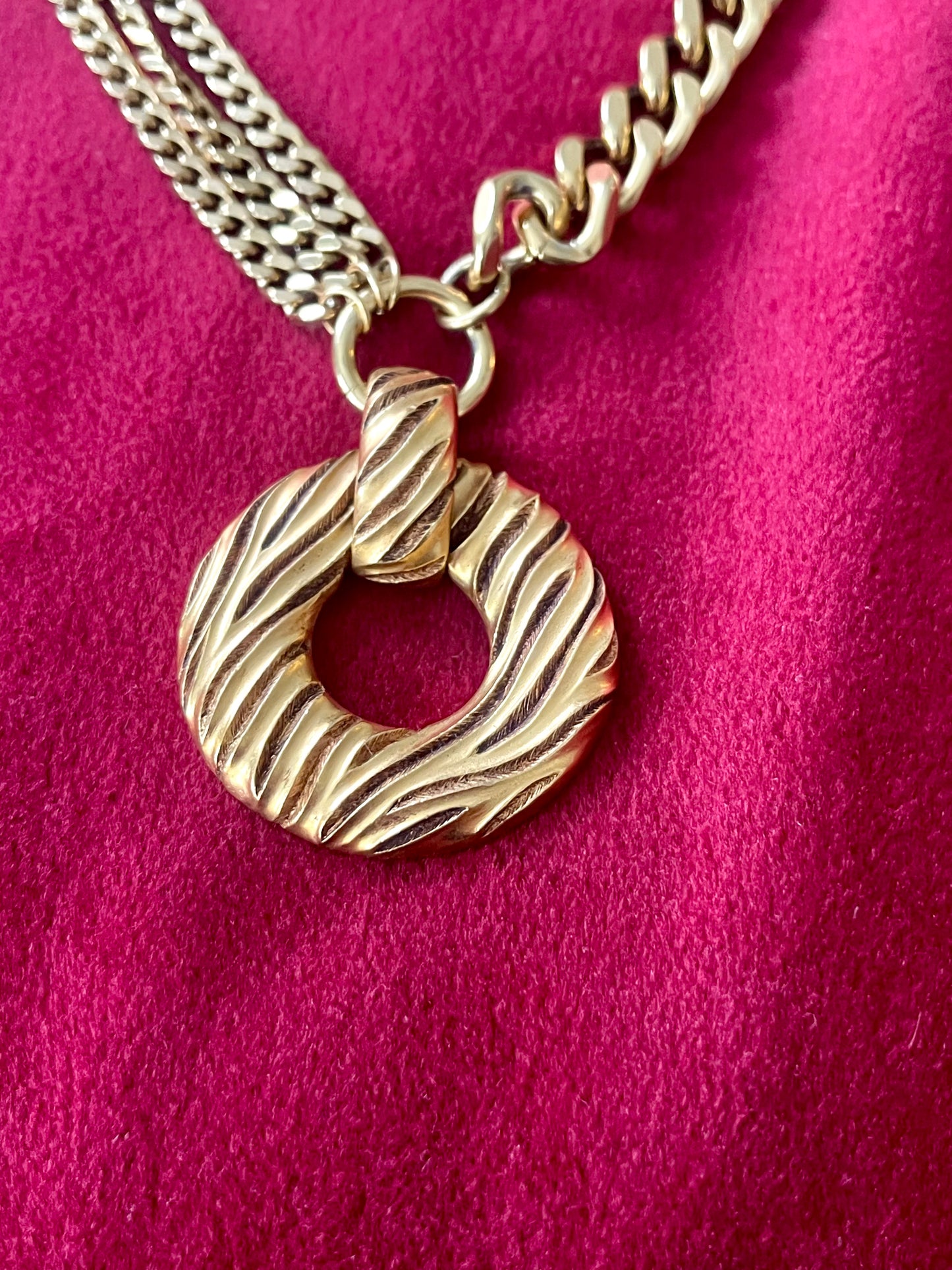 Close up on Yves Saint Laurent vintage 80s pendant  