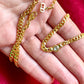 Bezel-set crystal centerpiece on vintage Dior 18K gold necklace