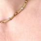 Vintage Christian Dior two-tone necklace worn around the neck, showcasing its elegant designer style from each side very good condition 