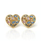 Heart-shaped vintage 80s Yves Saint Laurent earrings with multicolored gemstones on a white background