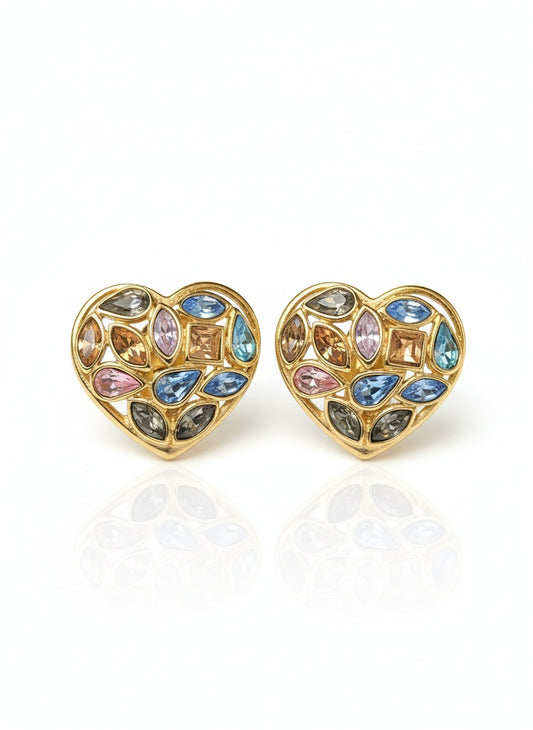 Heart-shaped vintage 80s Yves Saint Laurent earrings with multicolored gemstones on a white background
