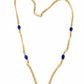 vintage Grossé Dior two-sided necklace with one side featuring rhinestone-encrusted pendants and the reverse side displaying blue gold-leafed stones.