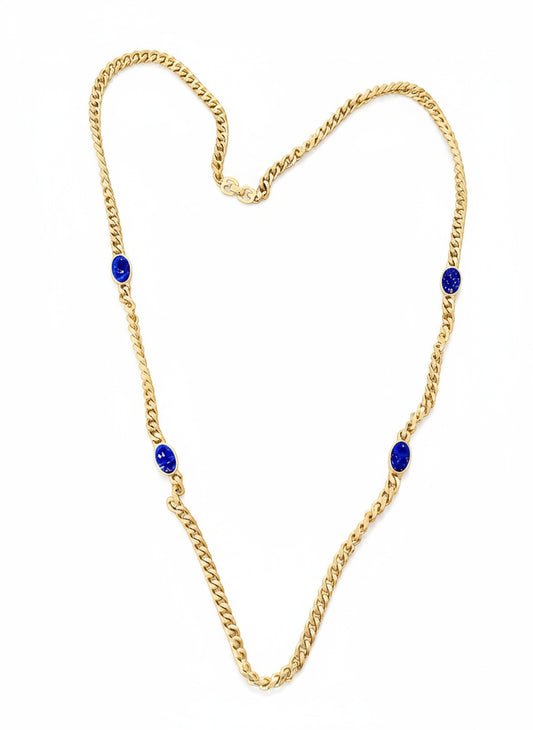vintage Grossé Dior two-sided necklace with one side featuring rhinestone-encrusted pendants and the reverse side displaying blue gold-leafed stones.