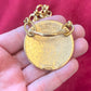 Collar de acero con porta bufandas vintage de Yves Saint Laurent: auténtica joyería reutilizada