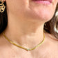 Vintage Christian Dior necklace worn, showcasing elegant gold chain and crystal detail