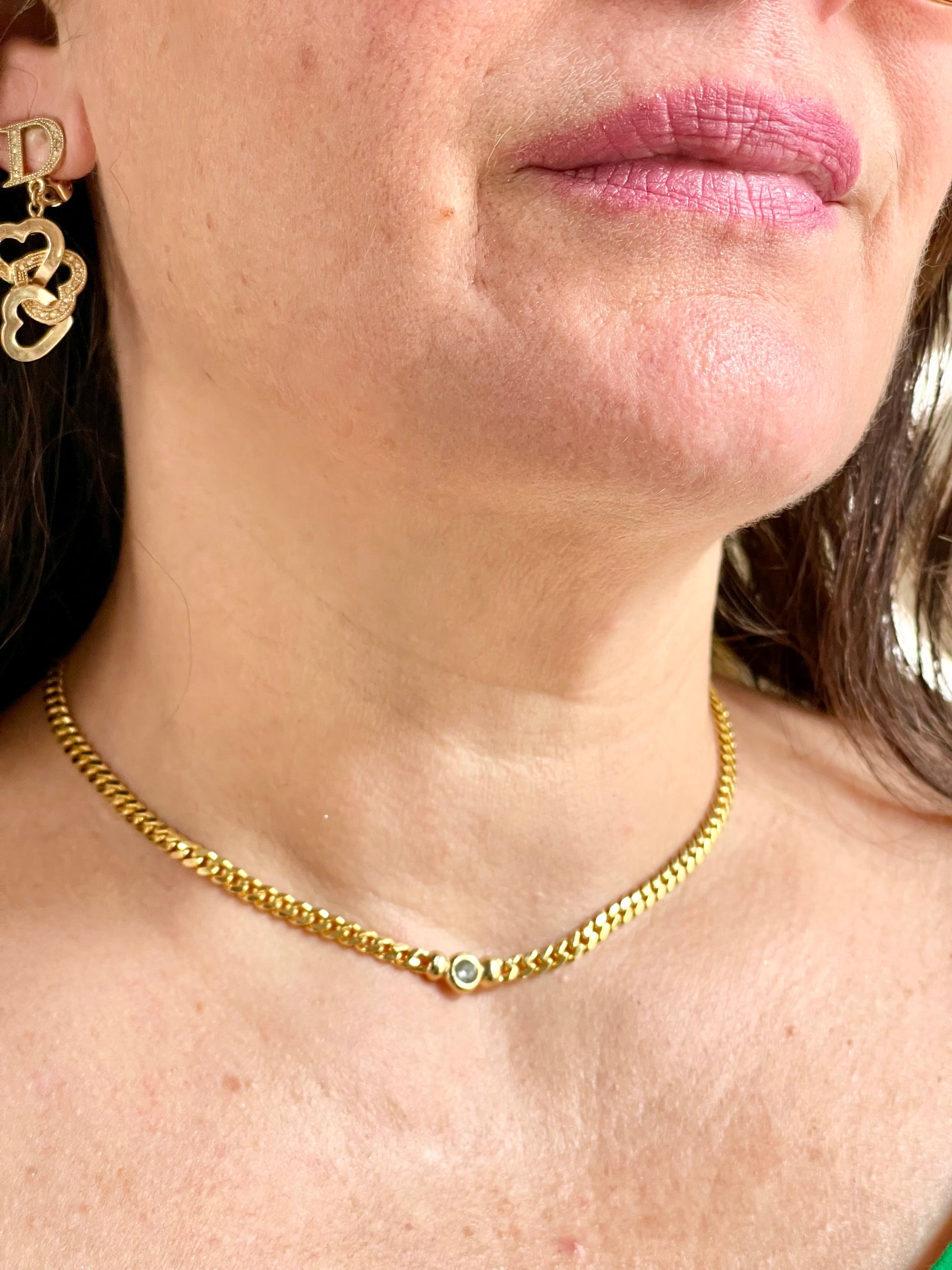 Vintage Christian Dior necklace worn, showcasing elegant gold chain and crystal detail