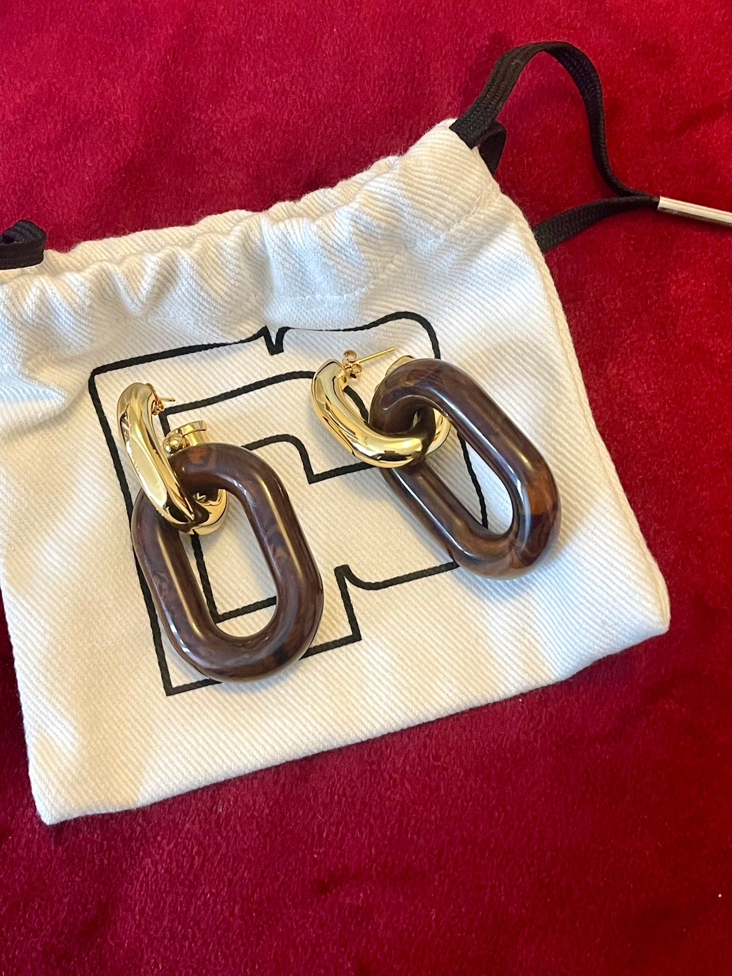 Boucles d'oreilles Paco Rabanne XL Link — Résine marron et métal doré (Collection 2025)
