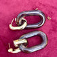 Boucles d'oreilles Paco Rabanne XL Link — Résine marron et métal doré (Collection 2025)