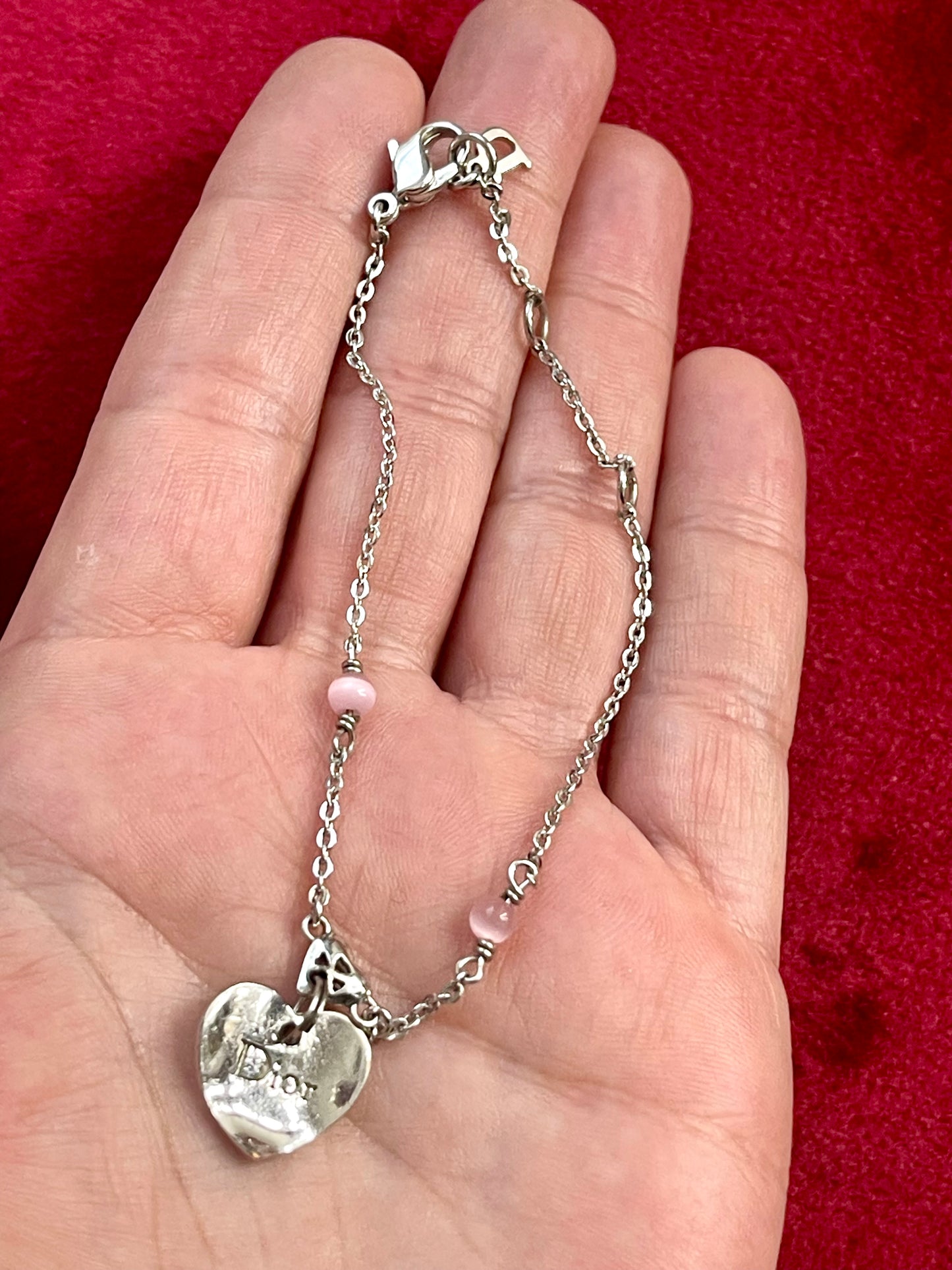 Displayed on hand a Vintage Dior silver tone rose beads chain bracelet with D charm signed 