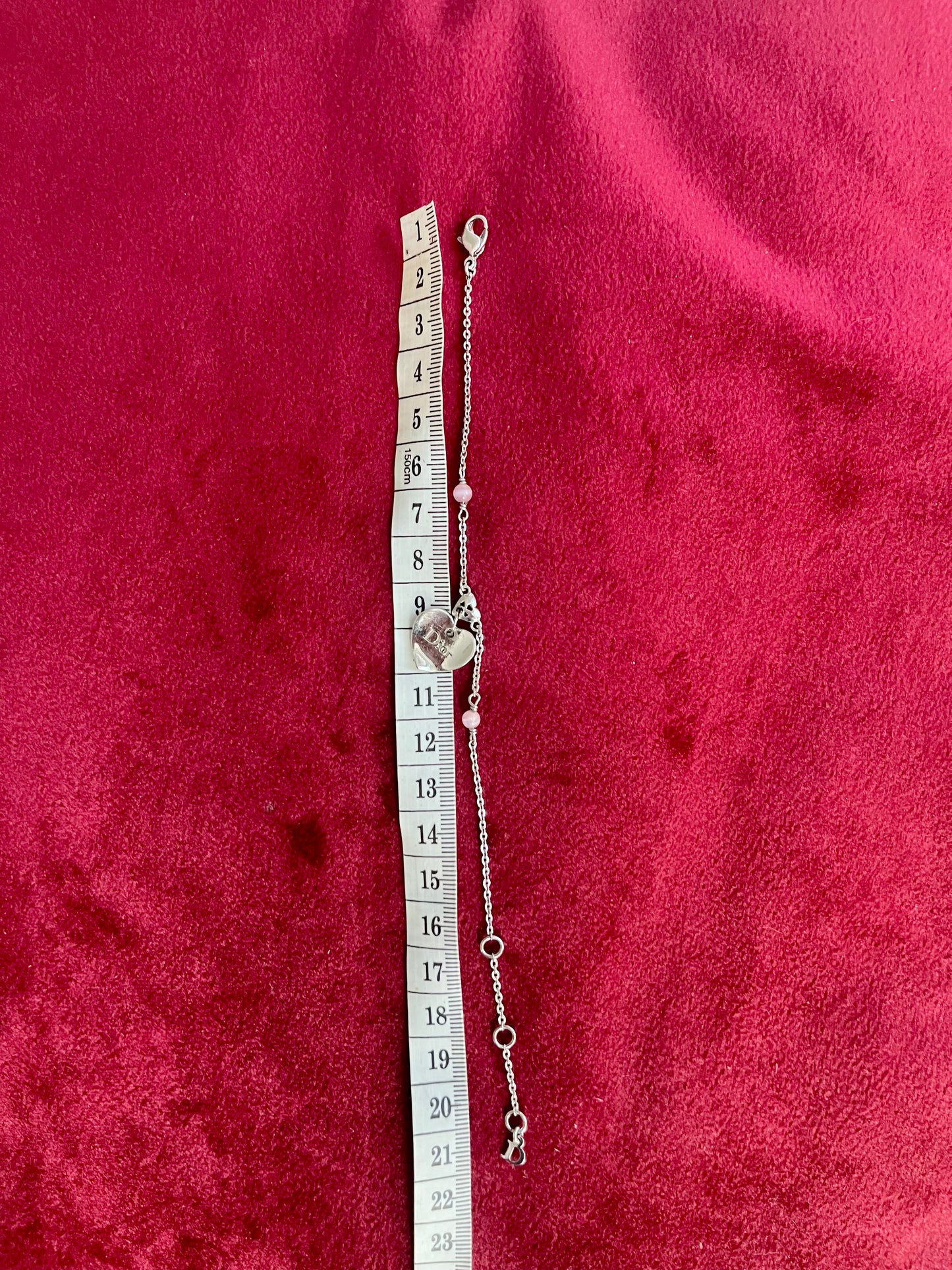 Using a measuring tape Vintage Dior silver tone rose beads chain bracelet with D charm signed 