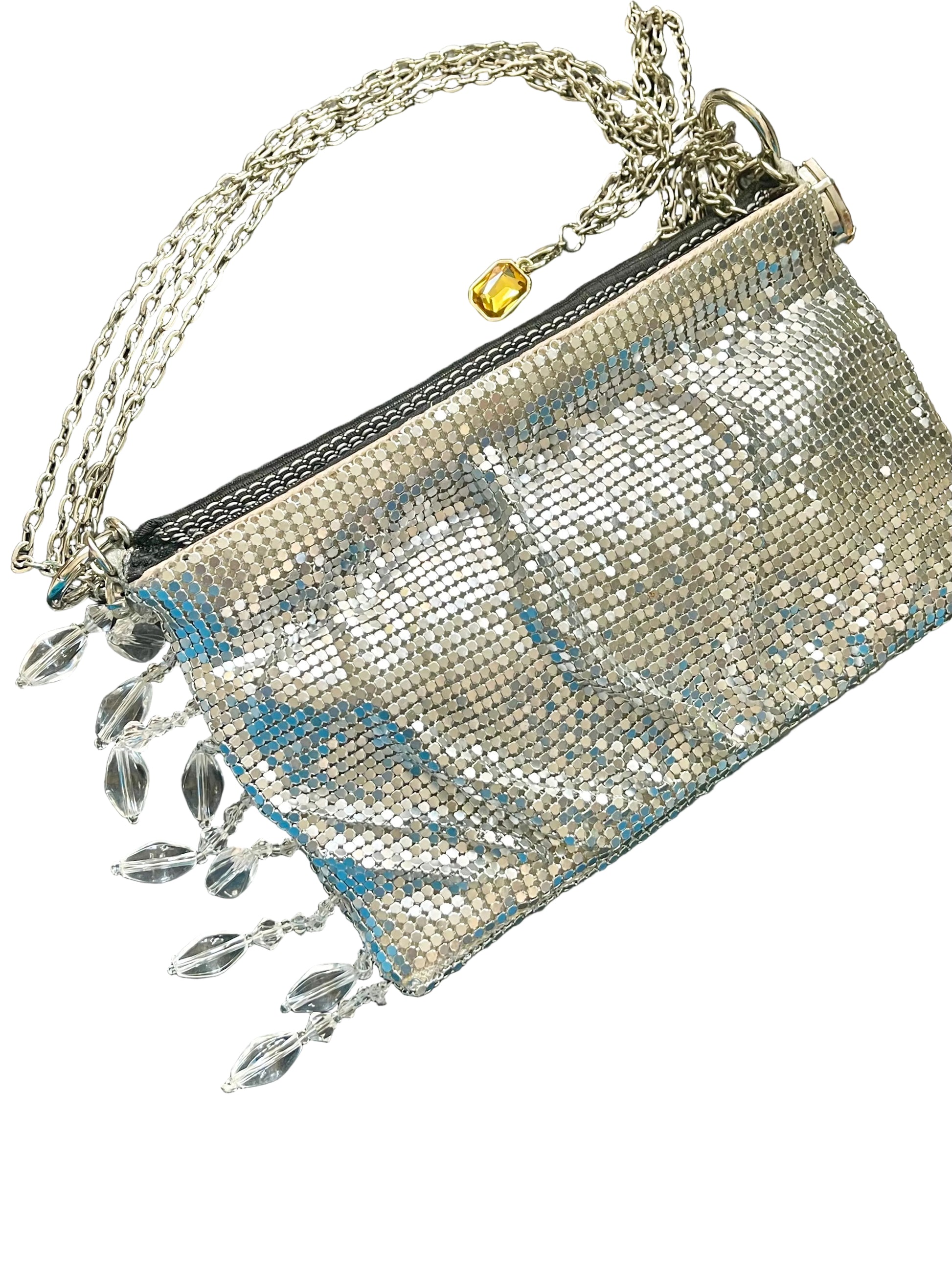 One of a kind handmade Paco Rabanne repurposed silver pixel mesh bag in white background 