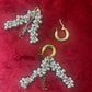 HoooGold and silver earrings with pearl-like beads and YSL Yves Saint Laurent charms showing flexibility of design 