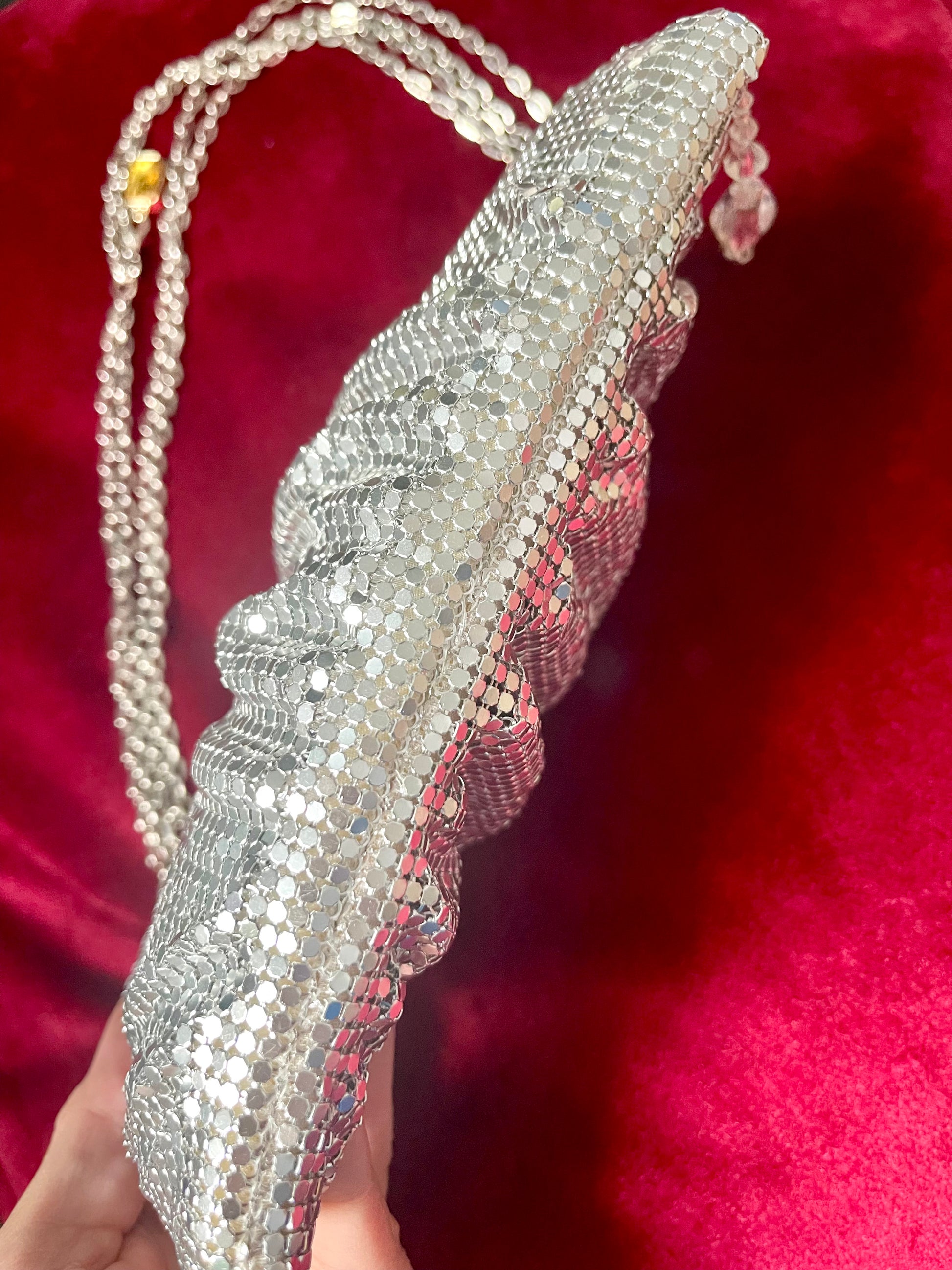 View of the bottom side of the One of a kind handmade Paco Rabanne repurposed silver pixel mesh bag