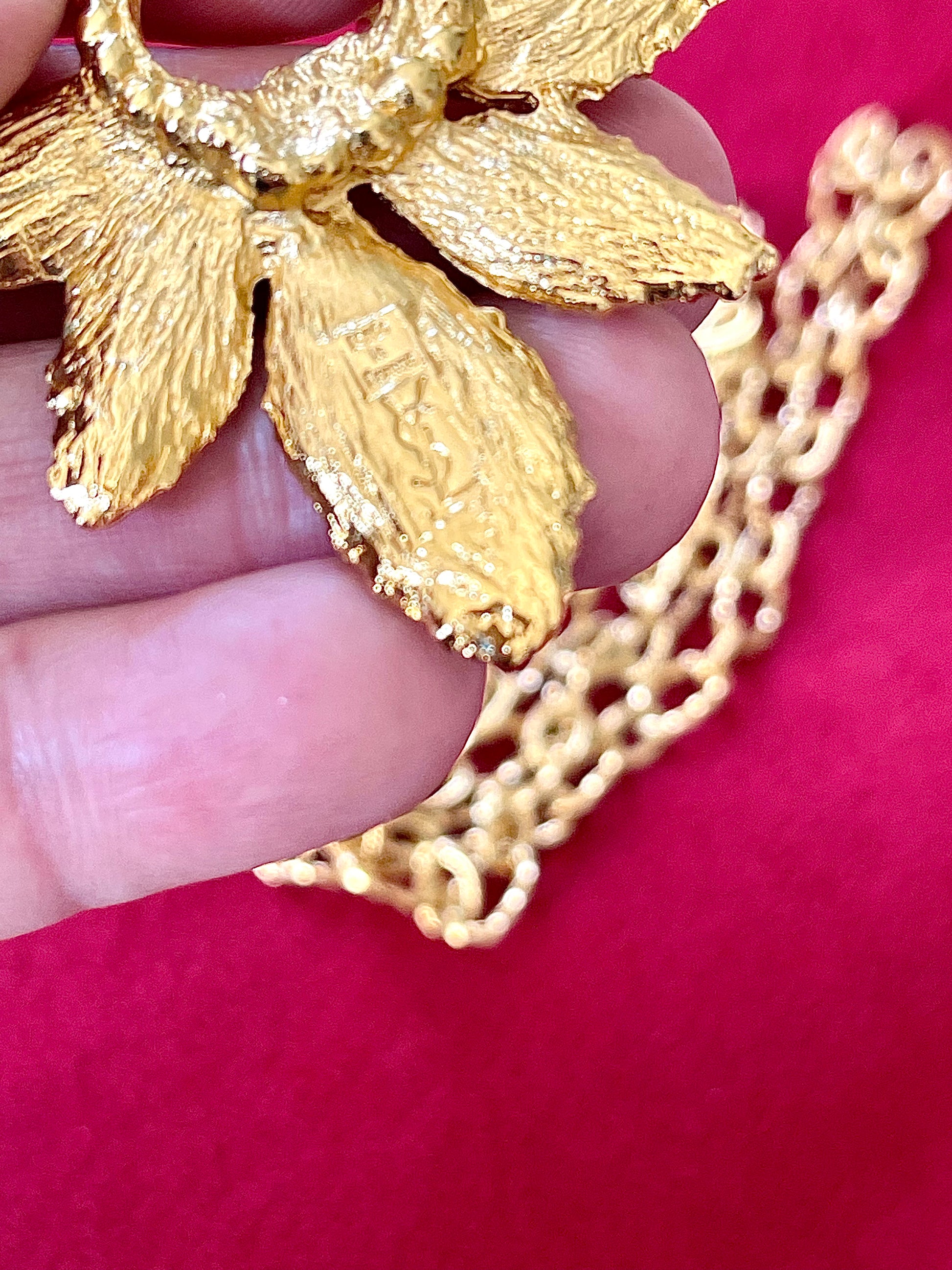 Made in France hallmark signature on Yves Saint Laurent pendant 80s collector item jewelry 
