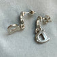 Pendientes vintage Christian Dior chapados en oro blanco de 18 kg
