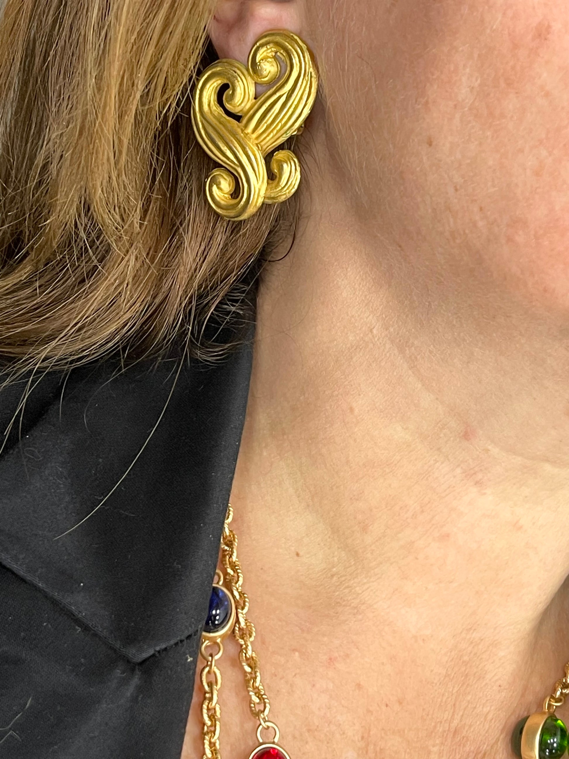 Vintage Nina Ricci statement heart earrings shown worn for scale Worn by model