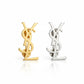 gold and silver tone Yves Saint Laurent Pins 