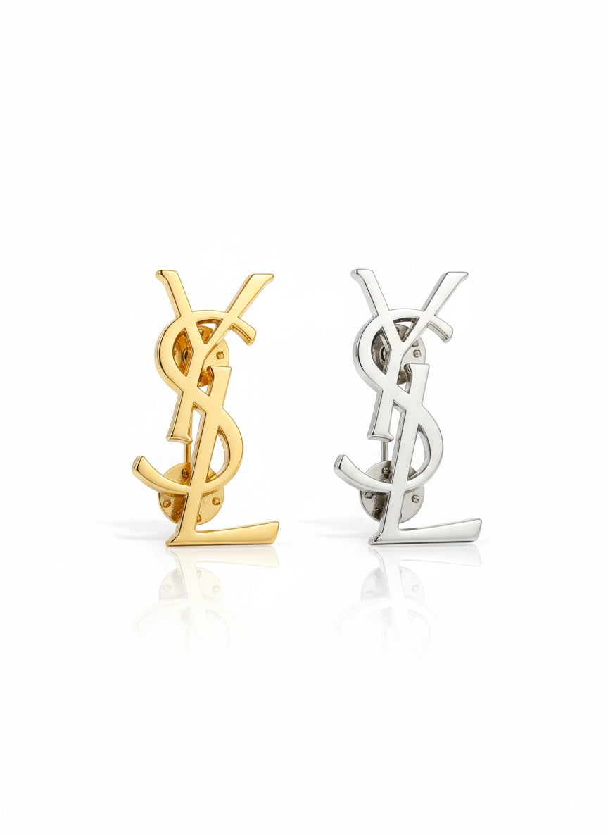 gold and silver tone Yves Saint Laurent Pins 