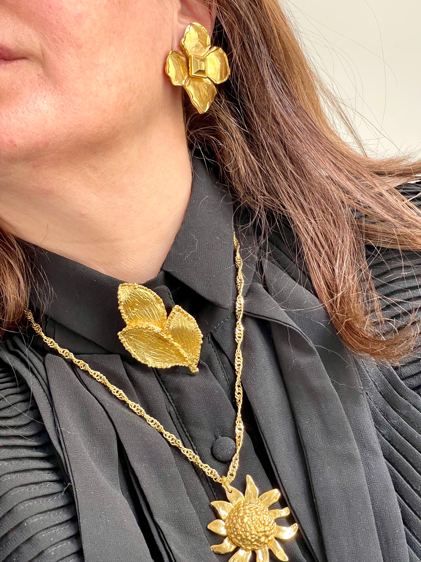Worn by model with other accessories Vintage Yves Saint Laurent 80s 90s gold tone leaf brooch excellent condition