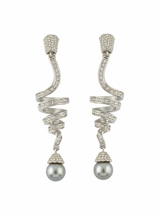 Grossé silver-tone drop earrings with rhinestones and grey pearl on white background 
