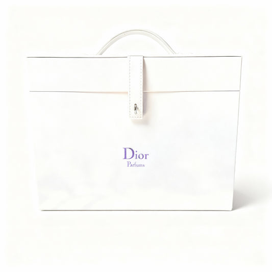 White Dior perfume bag with purple logo on a white background