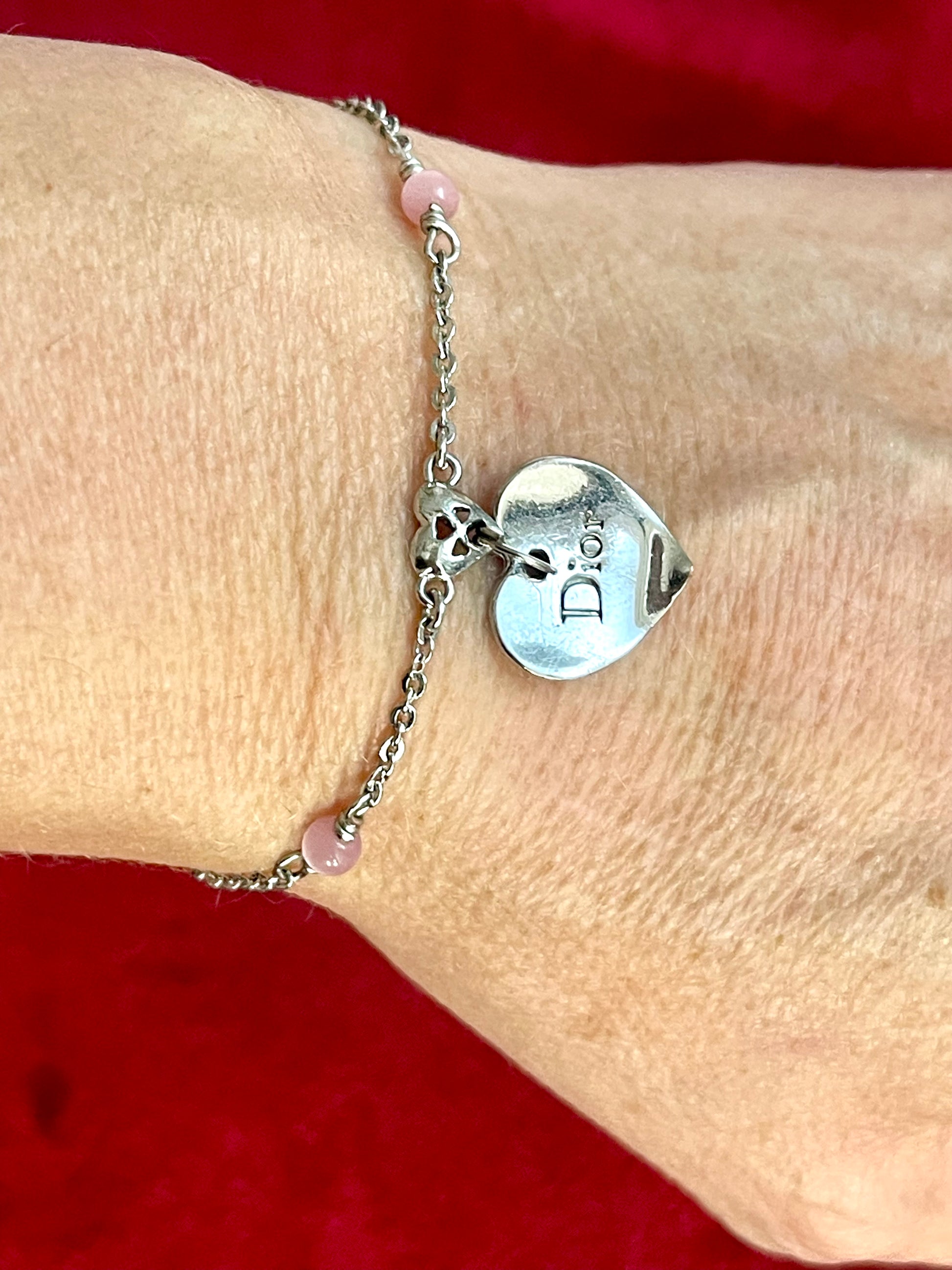 Worn on hand Vintage Dior silver tone rose beads chain bracelet with D charm signed 