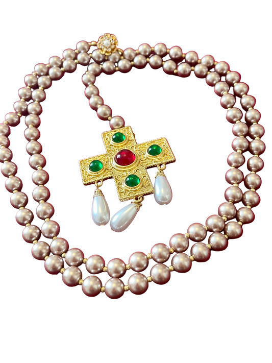  long faux pearl necklace with a gold-plated cross pendant and red gemstones at the end.style vintage Yves Saint Laurent Chanel Givenchy