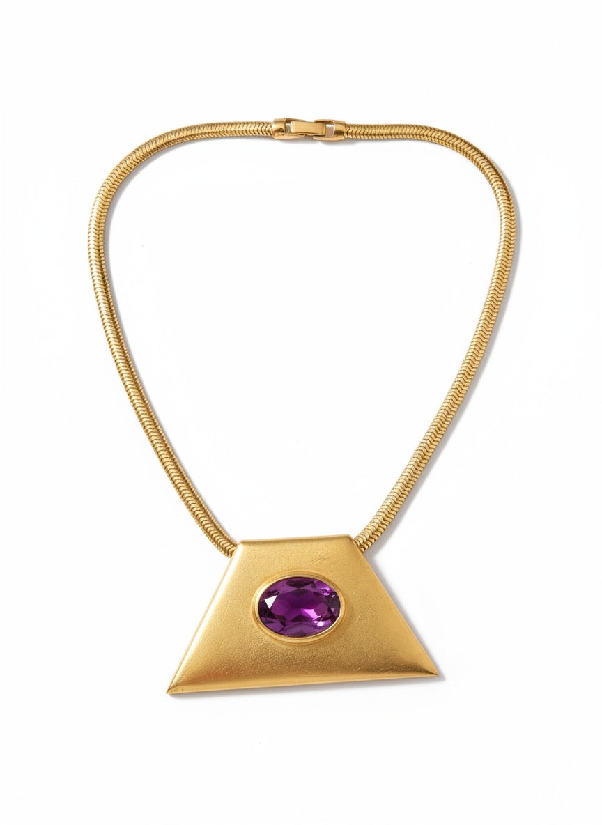 Geometric Pendant with purple center stone gold tone necklace from Yves Saint Laurent from the 70s