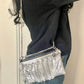 Worn by model as a long chain One of a kind handmade Paco Rabanne repurposed silver pixel mesh bag