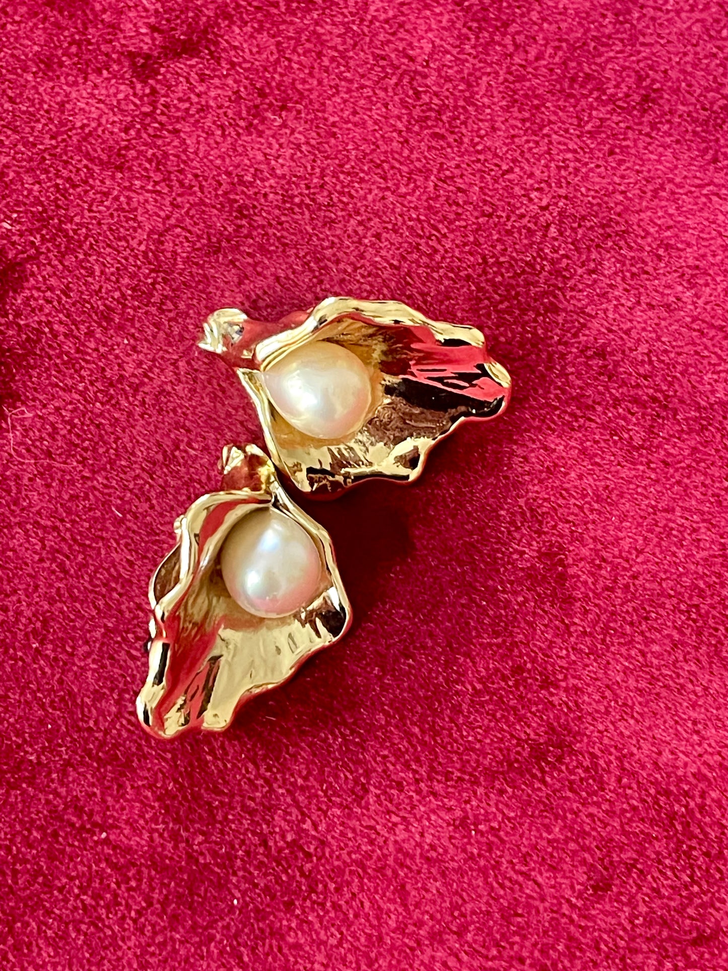 Vintage YSL statement earrings featuring gold-tone floral calla lily shape and luminous pearls