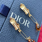 Boucles d'oreilles à épingles en or Dior