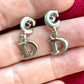 Pendientes vintage Christian Dior chapados en oro blanco de 18 kg