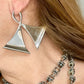 Left side worn by model Vintage Paco Rabanne silver-tone geometric sculptural statement earrings