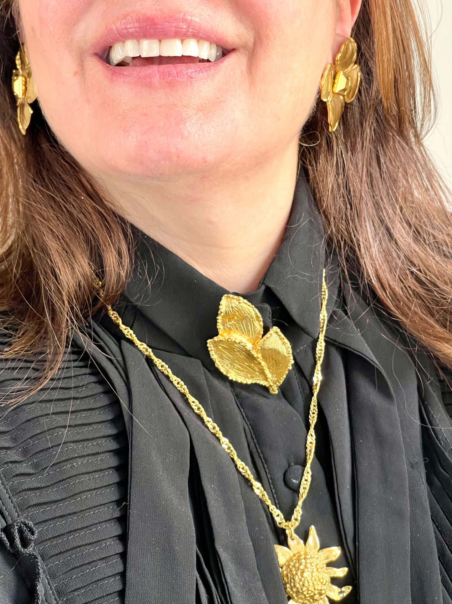 Vintage accessories styling authentic Vintage Yves Saint Laurent 80s 90s gold tone leaf brooch excellent condition worn by model 