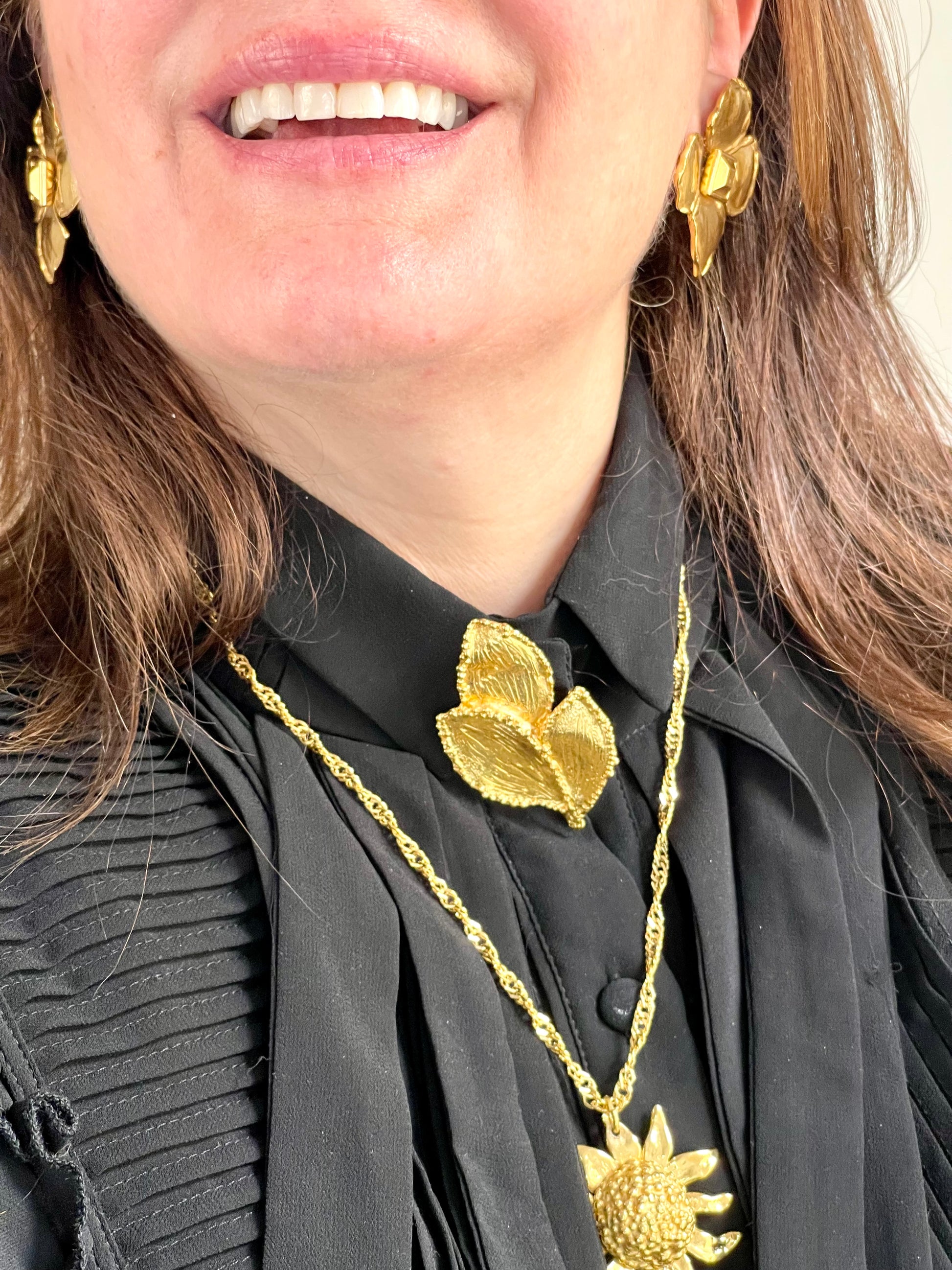 Vintage accessories styling authentic Vintage Yves Saint Laurent 80s 90s gold tone leaf brooch excellent condition worn by model 