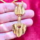 Collier pendentif vintage doré Yves Saint Laurent, style artistique, remis à neuf, 18 kg