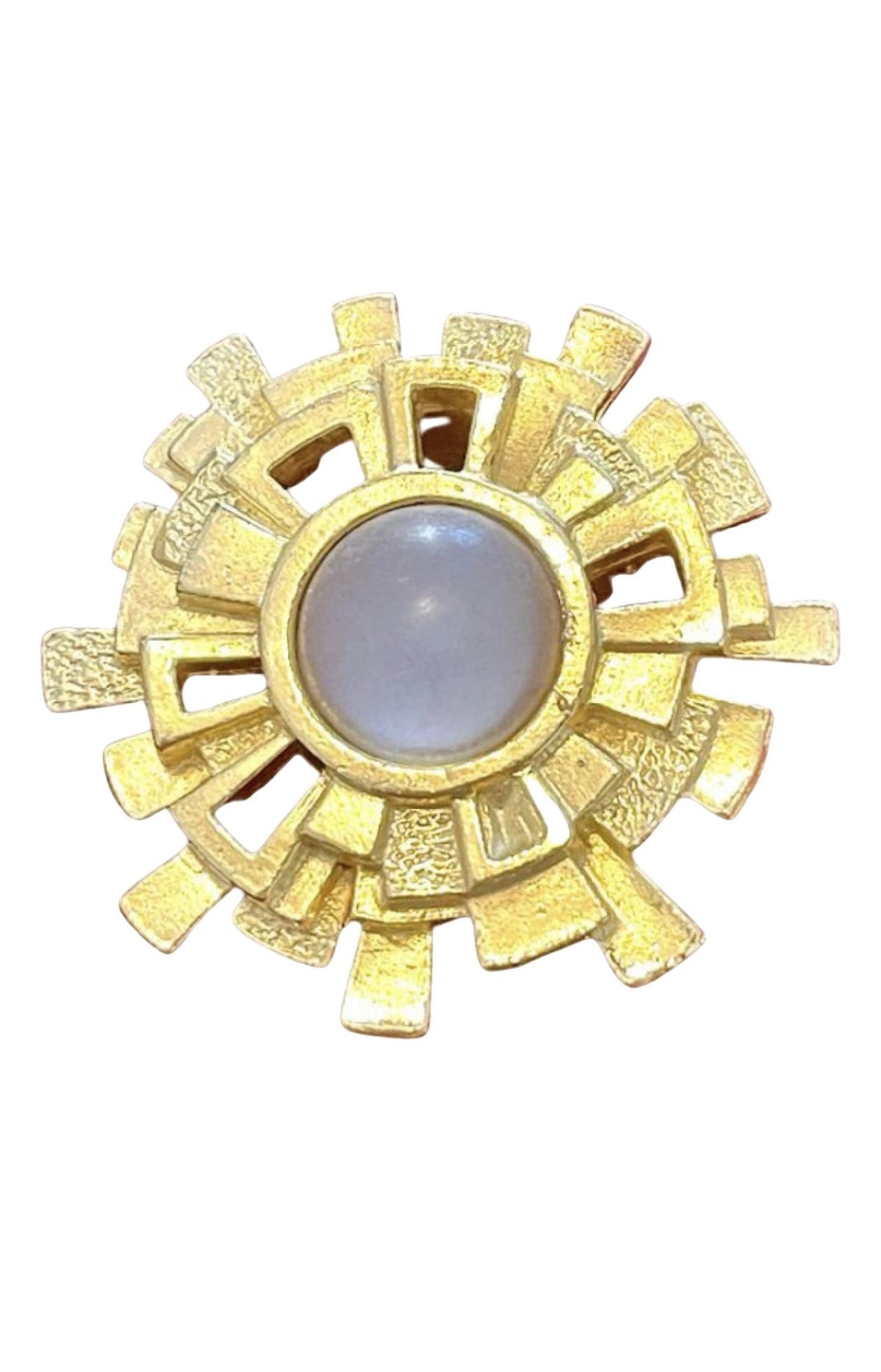 A vintage Paco Rabanne Paris brooch with a geometric design and a central milky cabochon stone, refurbished in 18K yellow gold.