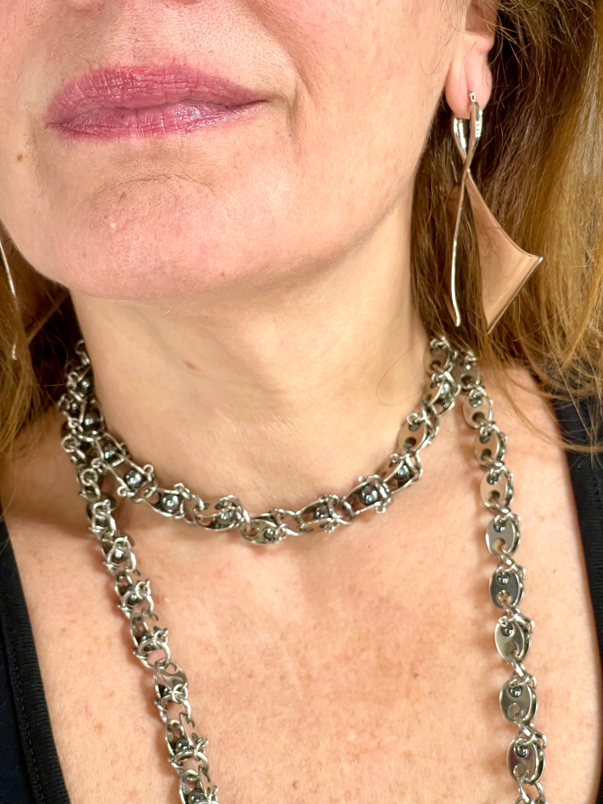 Side view worn by model Vintage Paco Rabanne silver-tone geometric sculptural statement earrings