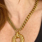 Gold tone 80s Yves Saint Laurent vintage pendant stainless steel chain necklace worn by model