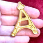 Authentic Vintage Yves Saint Laurent Eiffel Tower brooch