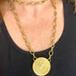 Collar de acero con porta bufandas vintage de Yves Saint Laurent: auténtica joyería reutilizada