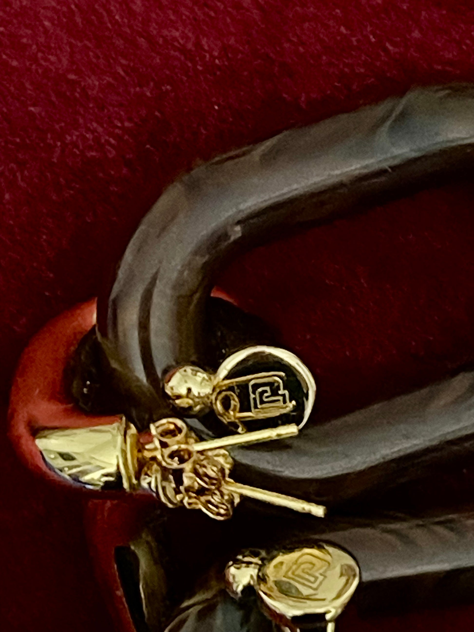 Butterfly clasp detail on Paco Rabanne XL Link earrings, brown resin and gold metal, made in Italy