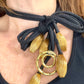 Styled differently Vintage Yves Saint Laurent YSL scarf holder worn as a one of a kind art textile statement necklace
