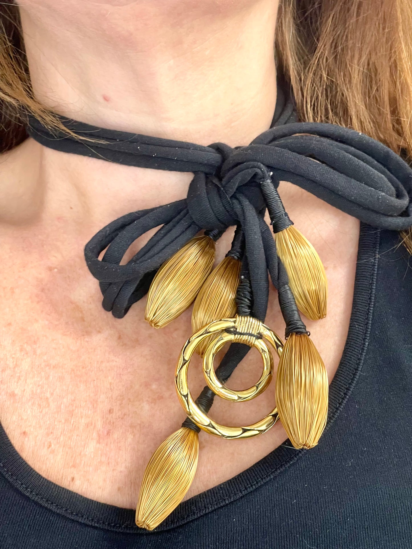 Styled differently Vintage Yves Saint Laurent YSL scarf holder worn as a one of a kind art textile statement necklace