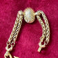 Backside top view Vintage Yves Saint Laurent crystal chain bracelet signed YSL Made in France