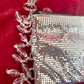 Close up on the clear beads of One of a kind handmade Paco Rabanne repurposed silver pixel mesh bag
