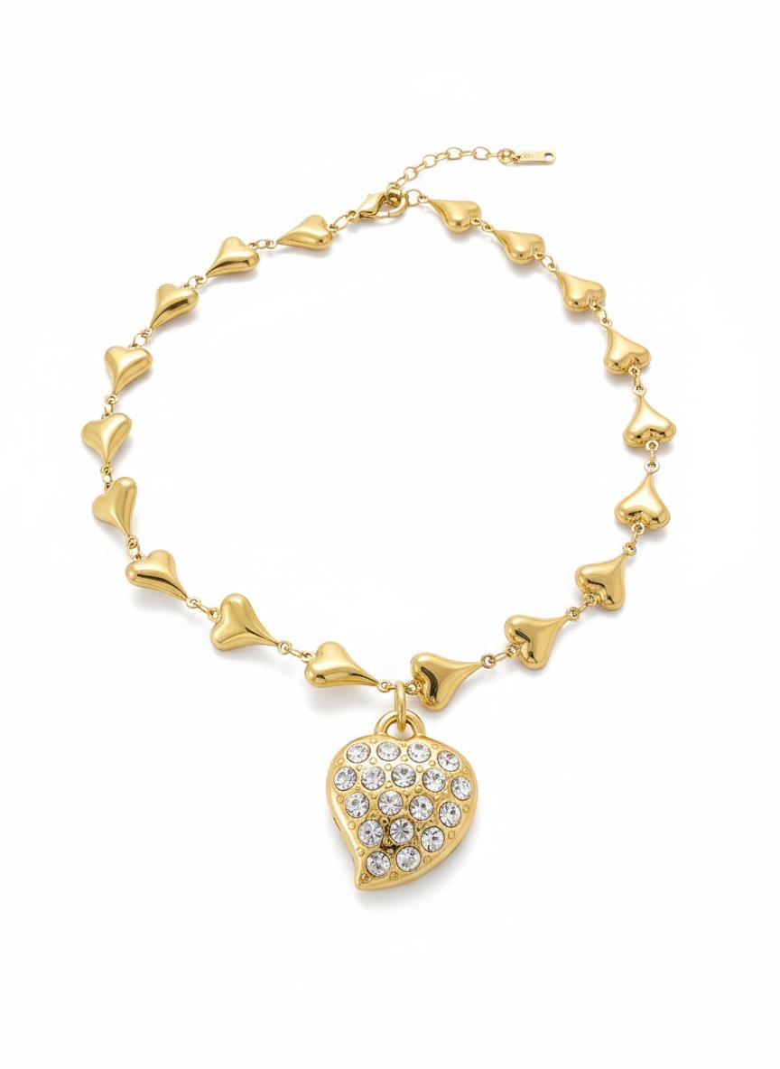 Authentic YSL heart pendant necklace with sculptural gold chain links, 23cm length, repurposed luxury jewelry